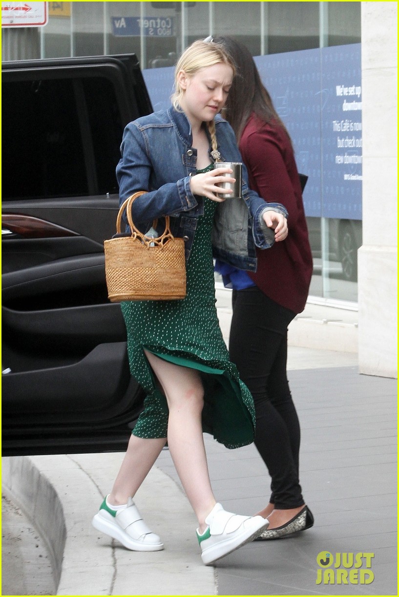 Dakota Fanning Dons Denim Jacket With Green Polka-Dot Dress for Work Meeting