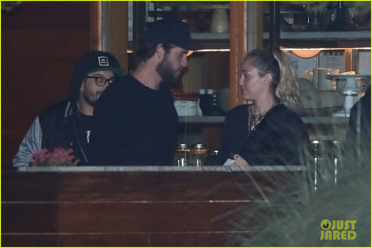 Miley Cyrus & Liam Hemsworth Have Late Night Out With Friends