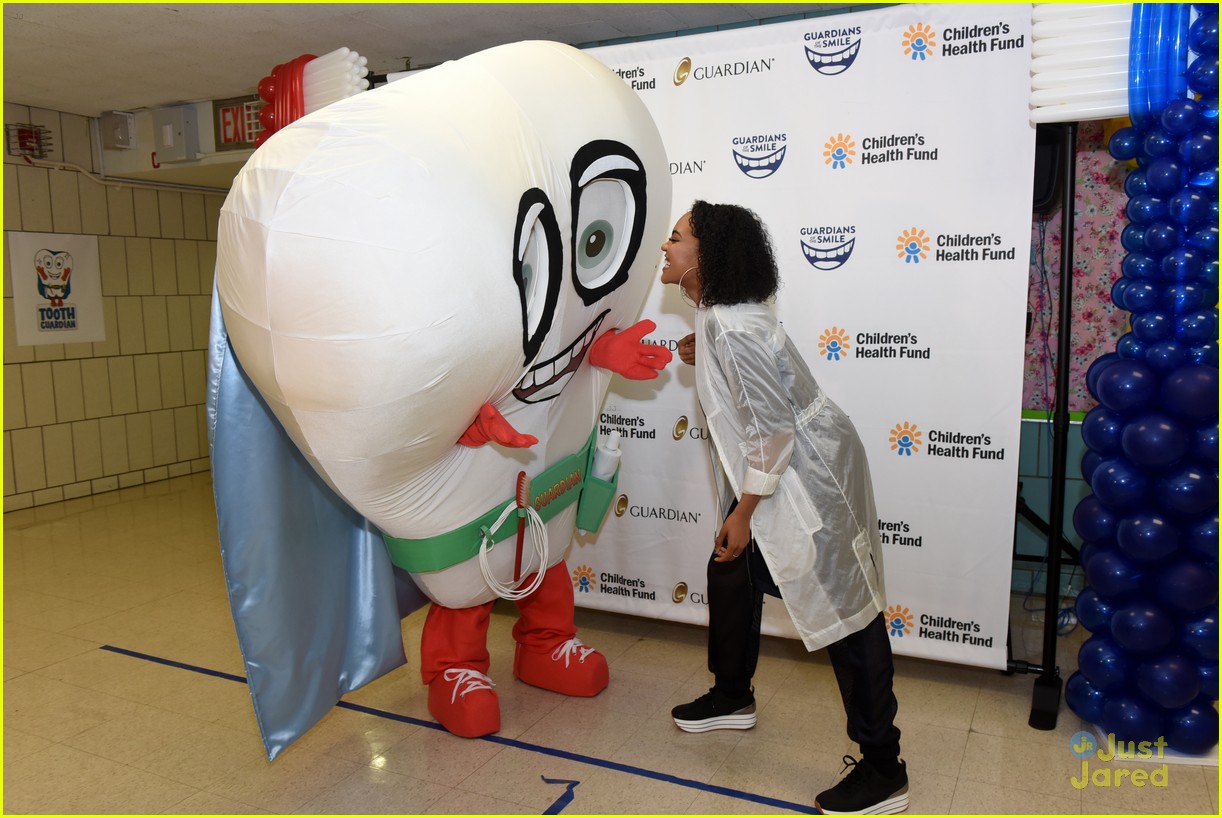 China Anne McClain Dances Around With Giant Tooth at Guardian & Children's Health Fun Oral Hygiene Launch