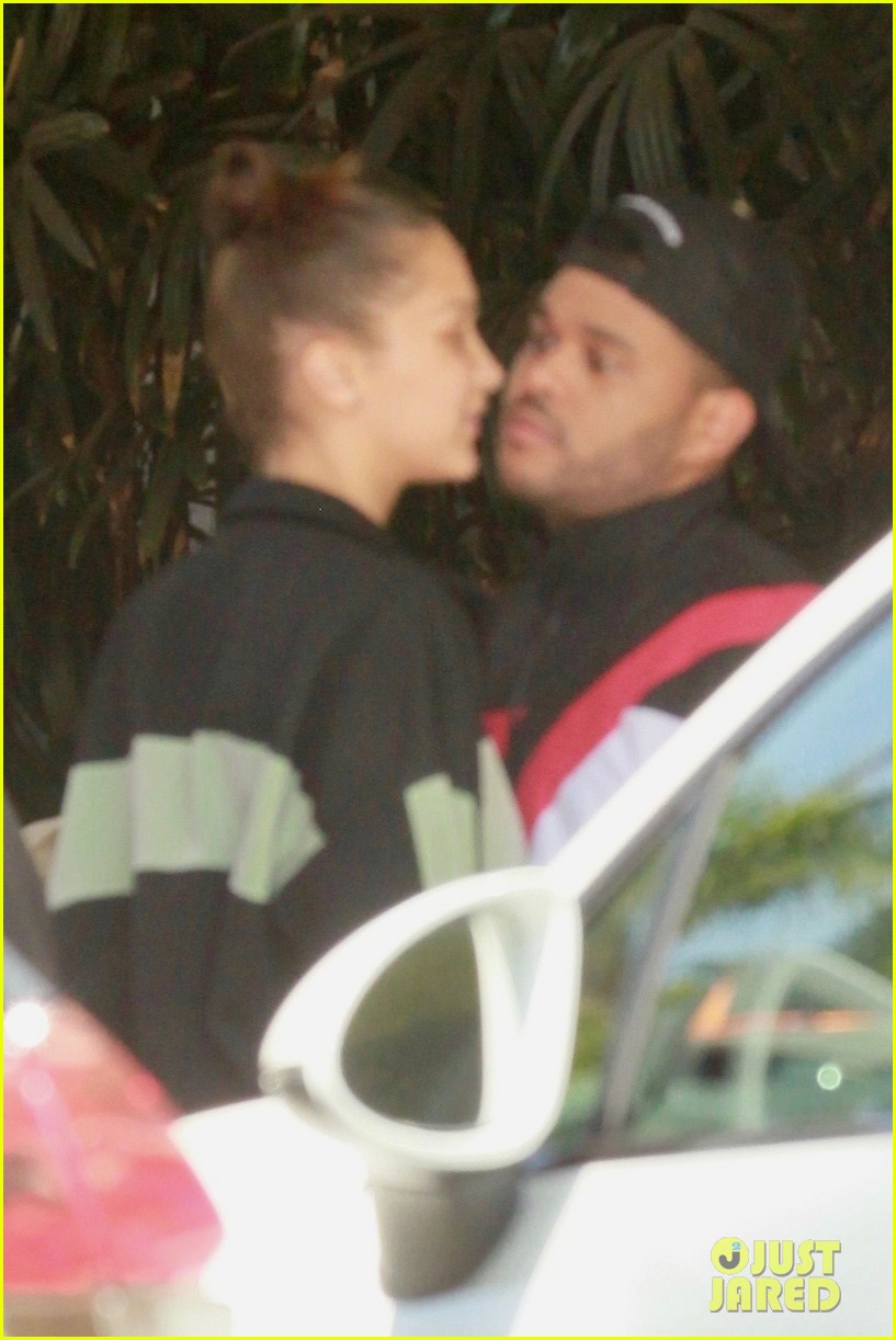 Bella Hadid Plants a Kiss on The Weeknd