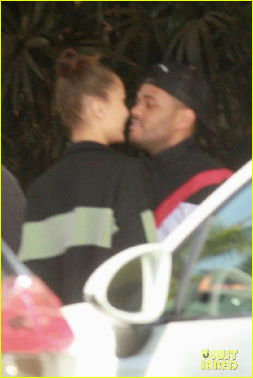 Bella Hadid Plants a Kiss on The Weeknd
