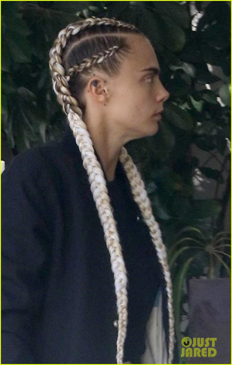 Cara Delevingne Kicks Off Her Day with a Meeting
