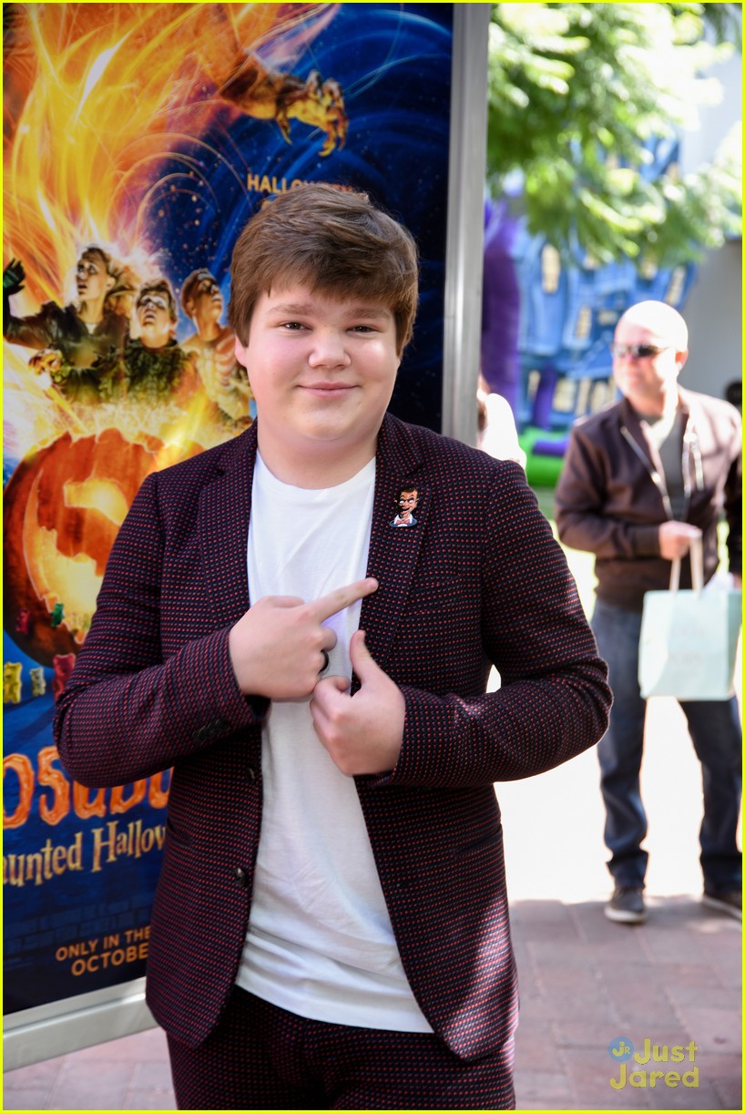 Madison Iseman Got a Kick Out of Ken Jeong's Coca-Cola Costume at the 'Goosebumps 2' Premiere