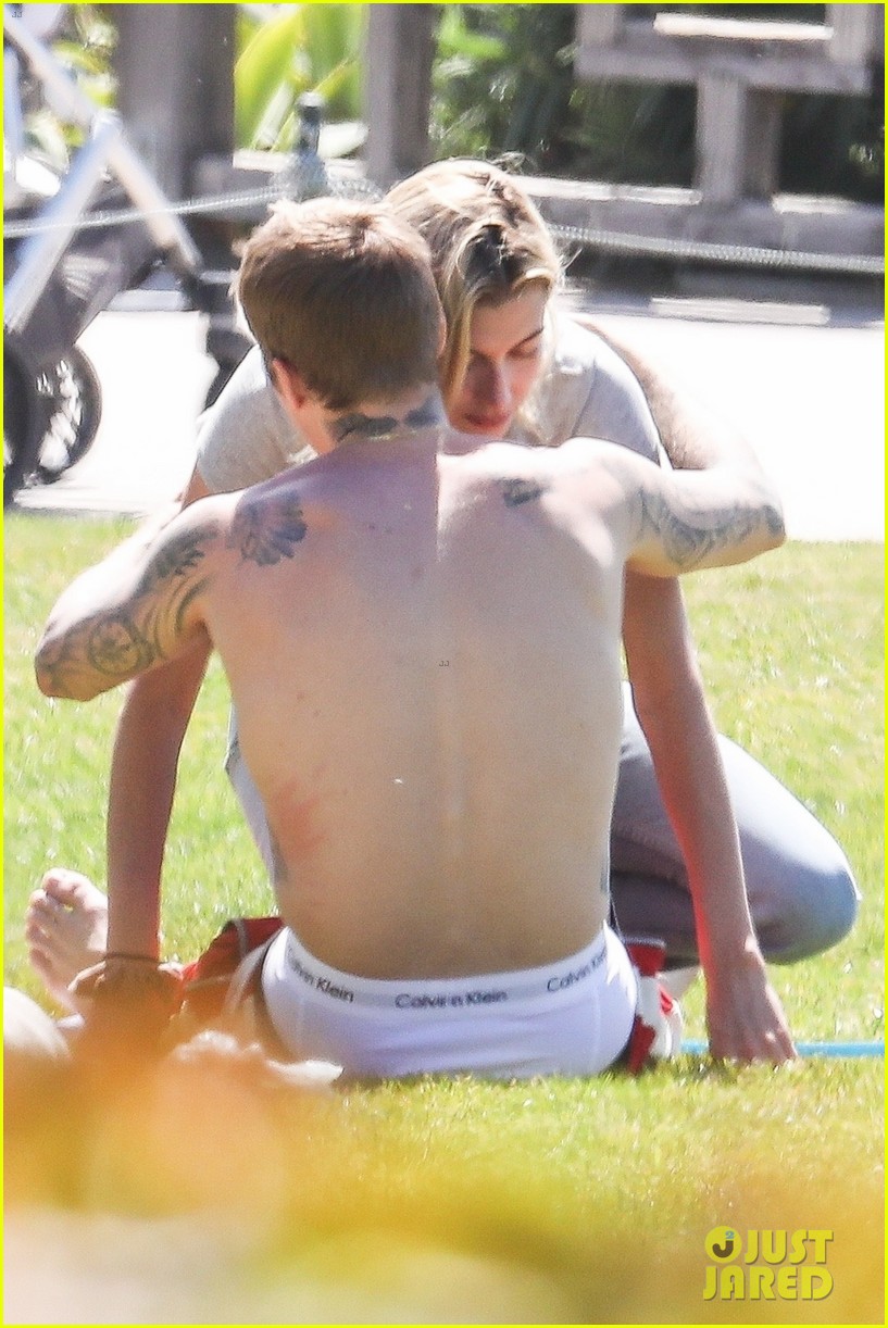 Justin & Hailey Bieber Hug It Out While Hanging Out at the Park