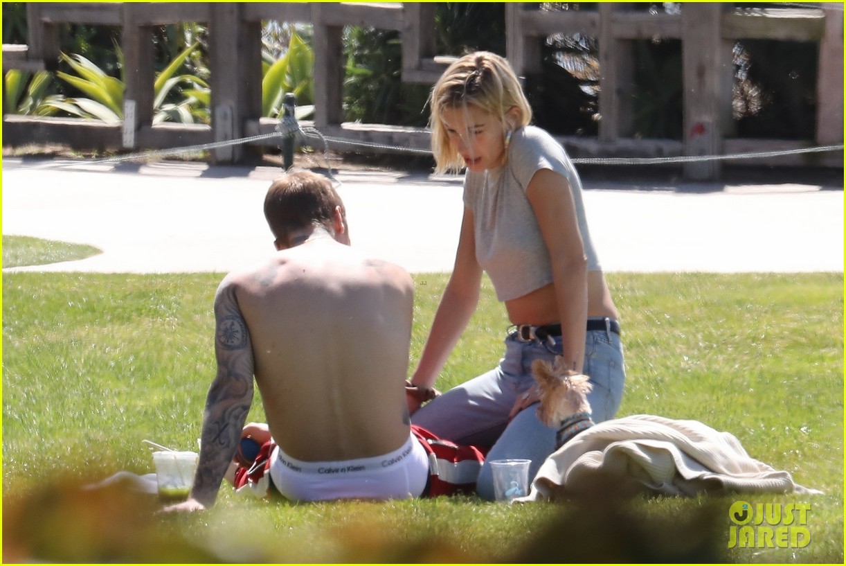 Justin & Hailey Bieber Hug It Out While Hanging Out at the Park