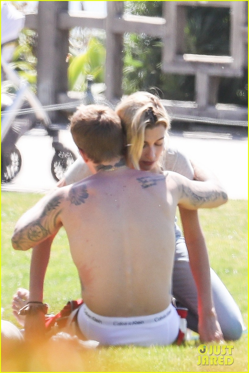 Justin & Hailey Bieber Hug It Out While Hanging Out at the Park
