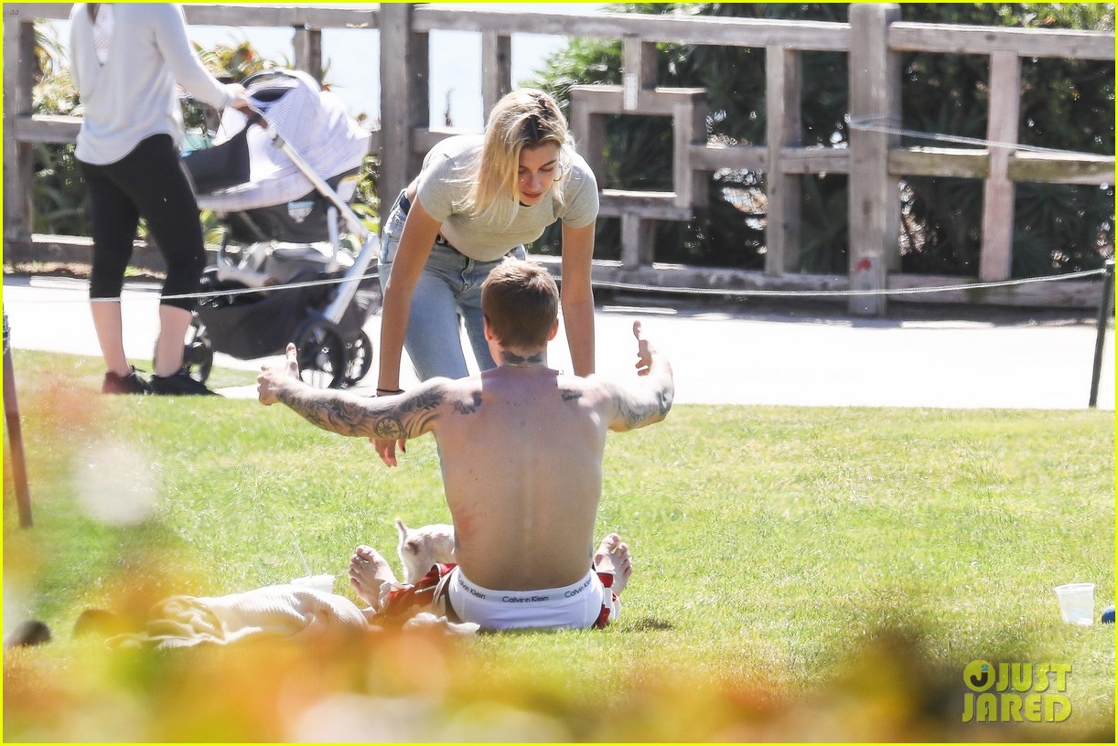 Justin & Hailey Bieber Hug It Out While Hanging Out at the Park