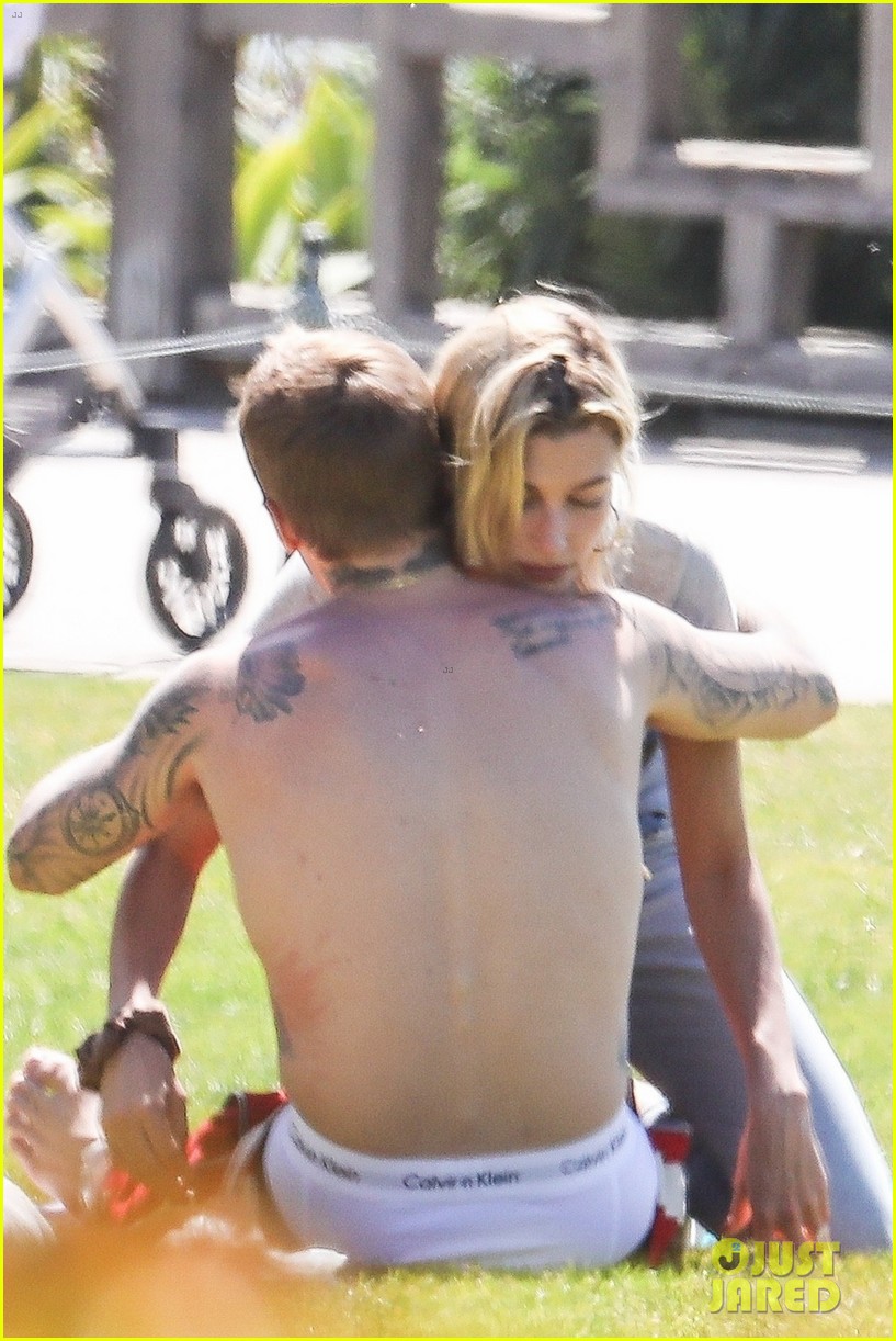 Justin & Hailey Bieber Hug It Out While Hanging Out at the Park