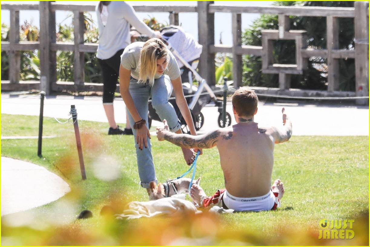 Justin & Hailey Bieber Hug It Out While Hanging Out at the Park