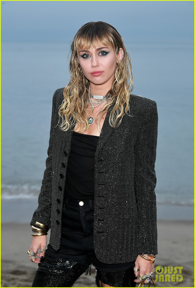 Miley Cyrus Steps Out for Saint Laurent Show with Liam Hemsworth