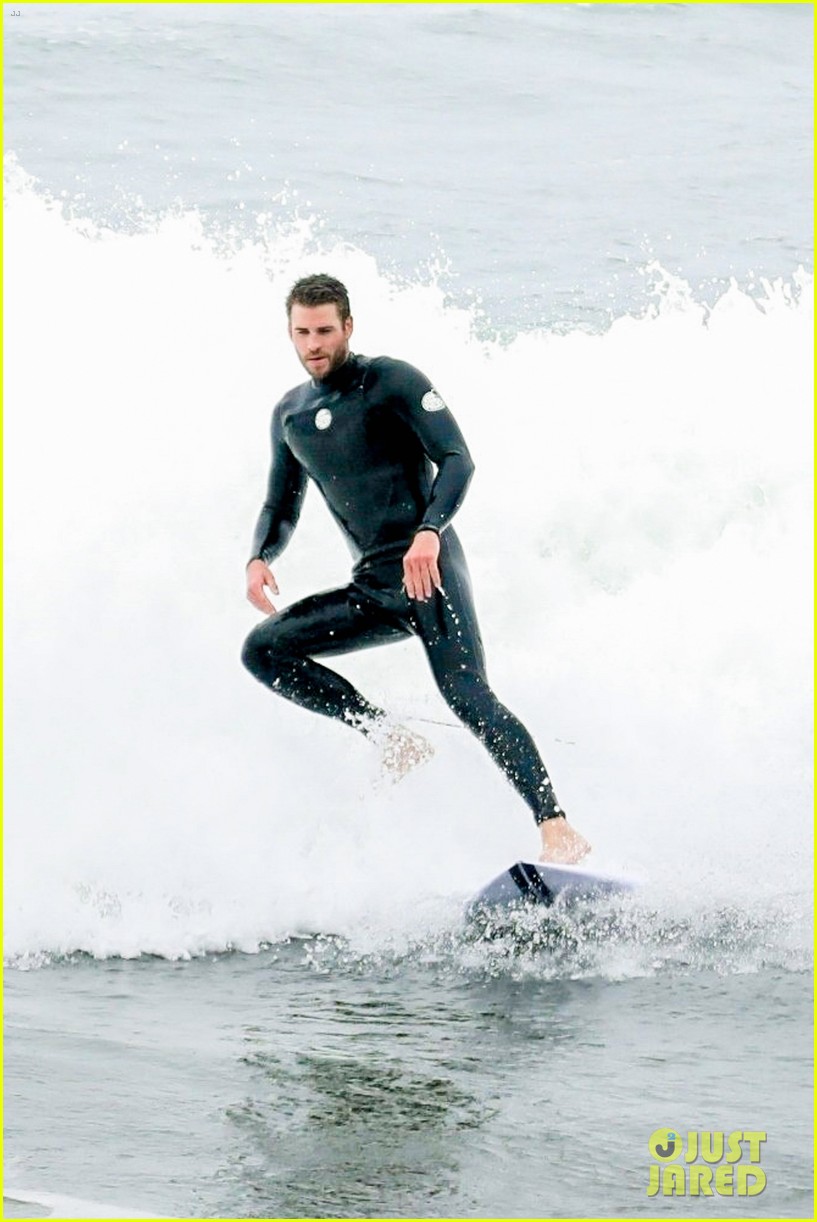 Liam Hemsworth Goes Surfing After Arriving Back in L.A.