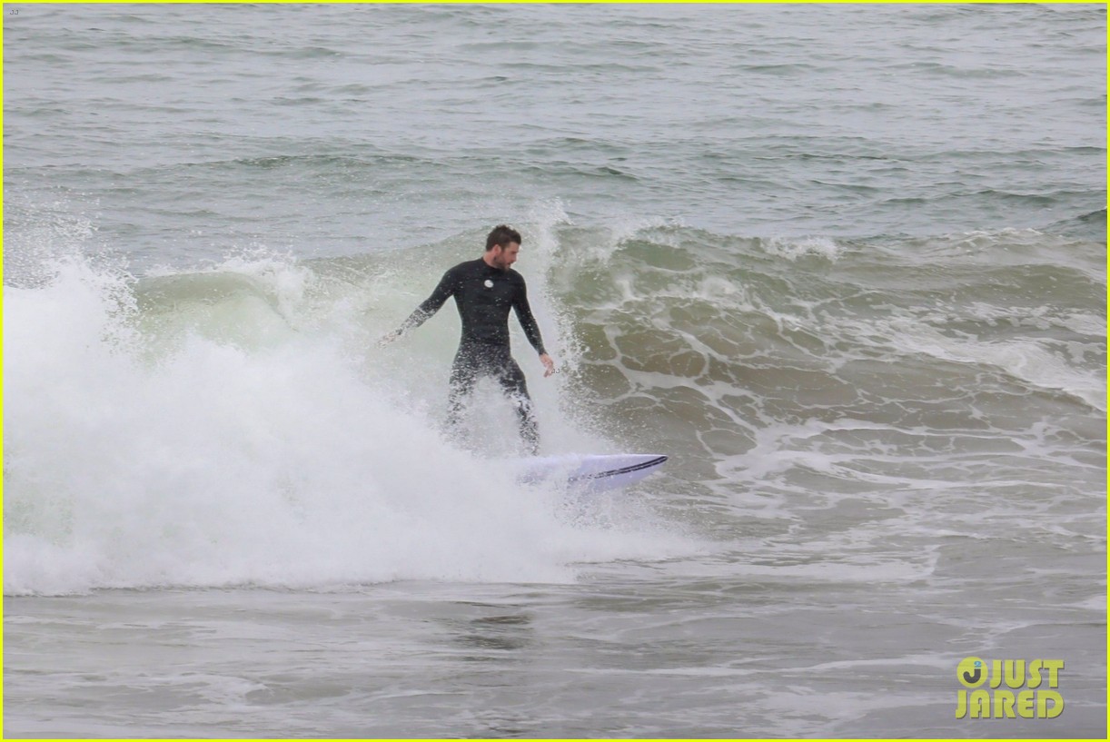 Liam Hemsworth Goes Surfing After Arriving Back in L.A.