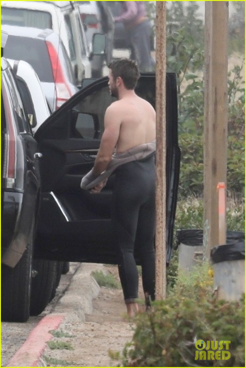 Liam Hemsworth Goes Surfing After Arriving Back in L.A.