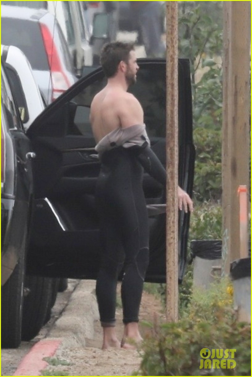 Liam Hemsworth Goes Surfing After Arriving Back in L.A.