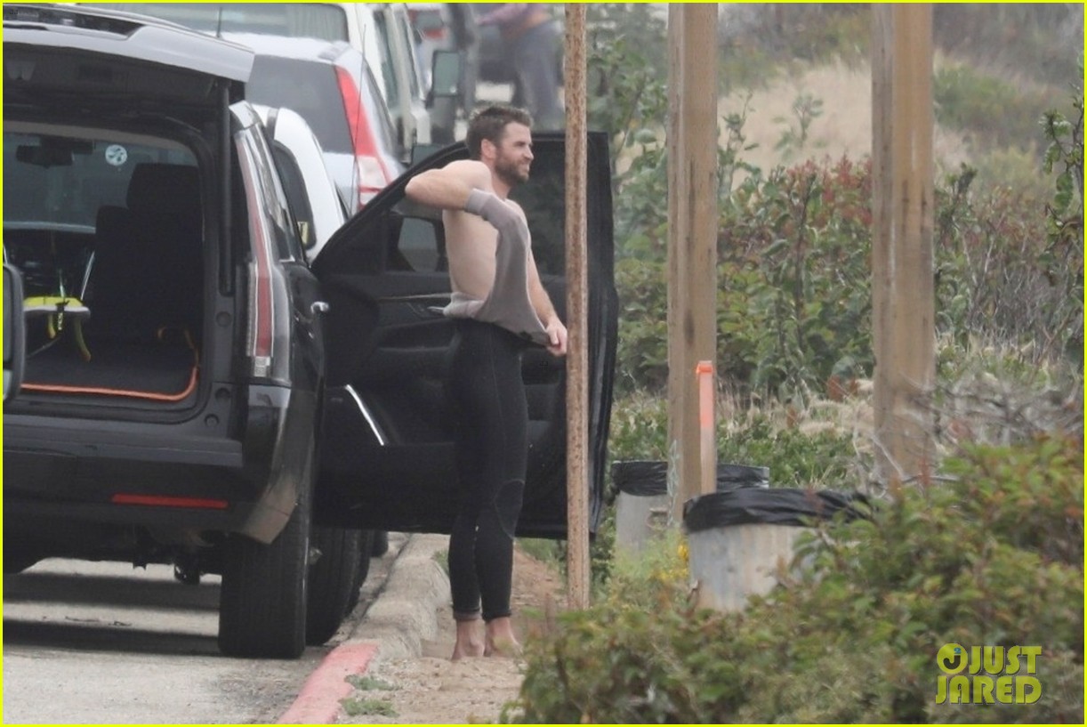 Liam Hemsworth Goes Surfing After Arriving Back in L.A.