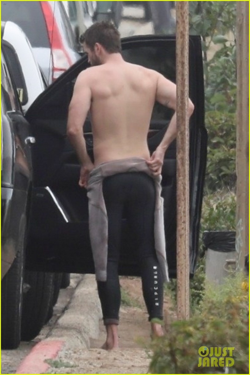 Liam Hemsworth Goes Surfing After Arriving Back in L.A.
