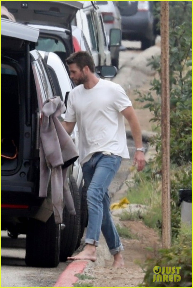Liam Hemsworth Goes Surfing After Arriving Back in L.A.