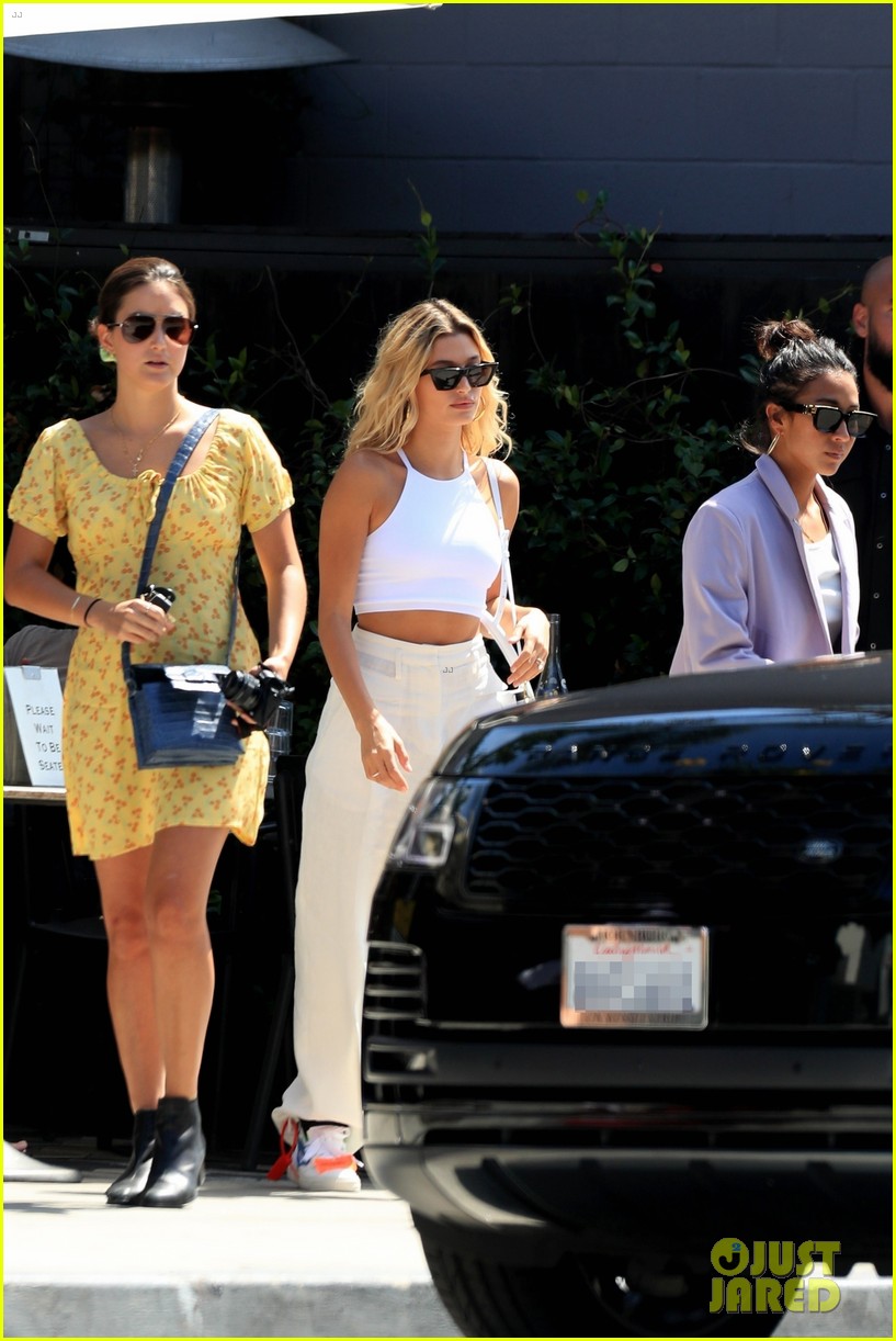 Hailey Bieber Wears All White For Sunday Lunch