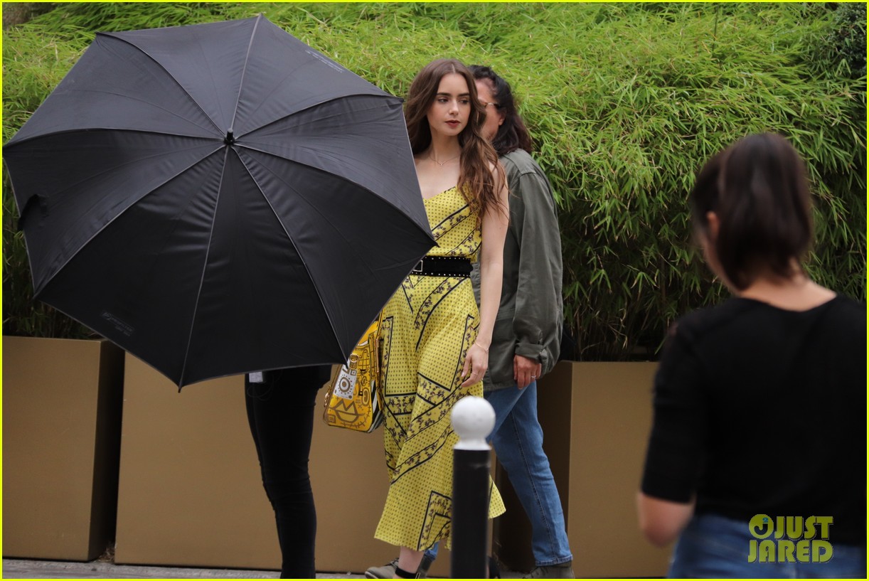 Lily Collins Wears a Red Beret For 'Emily in Paris' Filming
