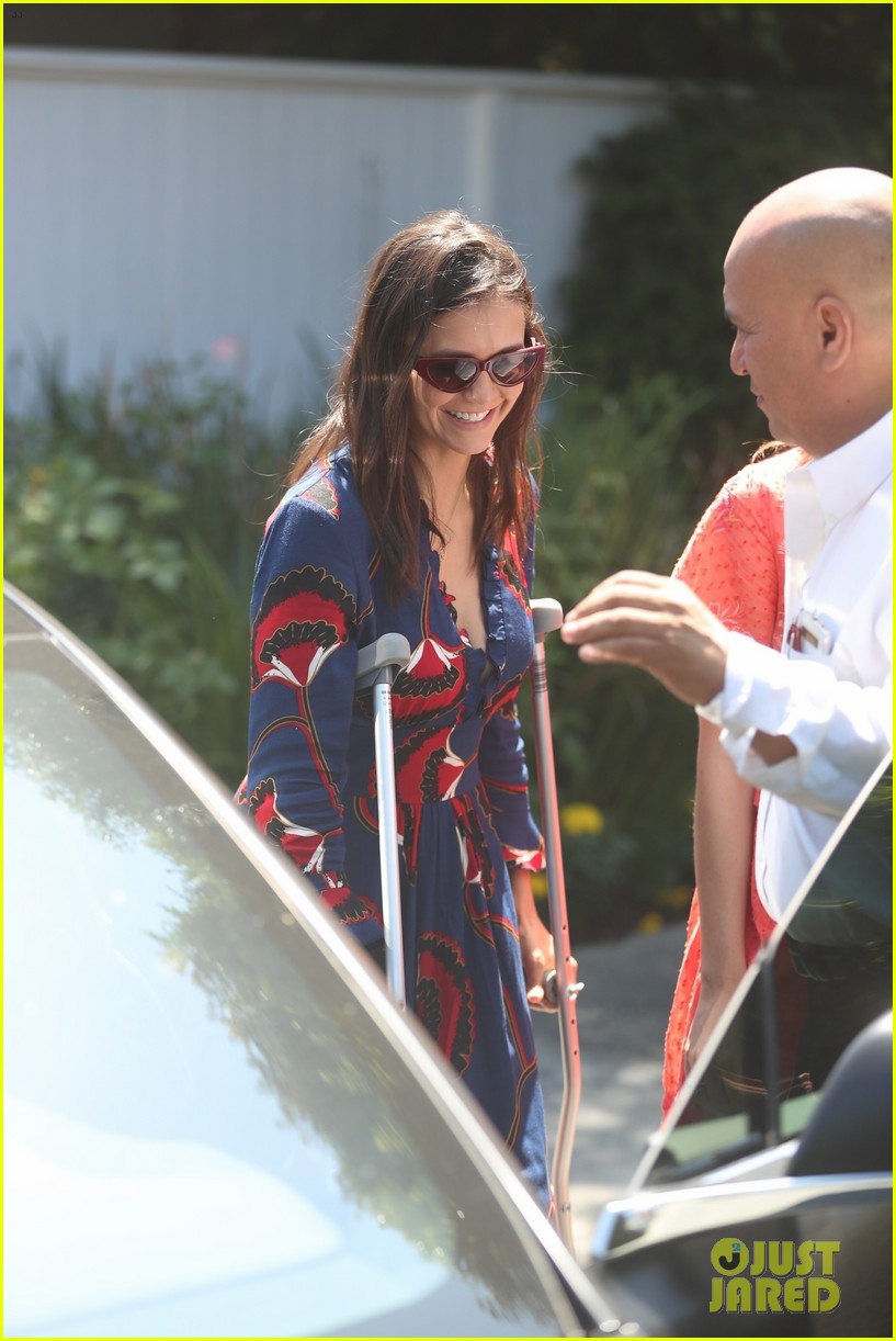 Nina Dobrev Uses Her Crutches While Attending Day of Indulgence Party