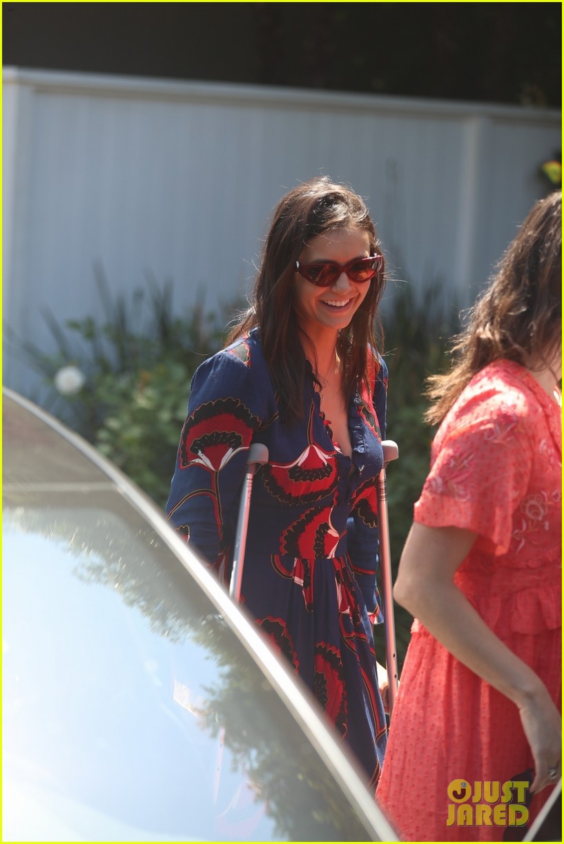 Nina Dobrev Uses Her Crutches While Attending Day of Indulgence Party