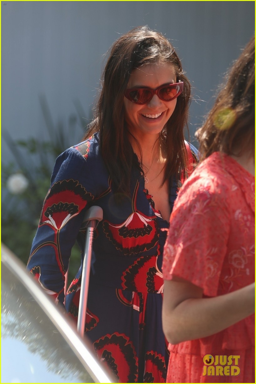 Nina Dobrev Uses Her Crutches While Attending Day of Indulgence Party