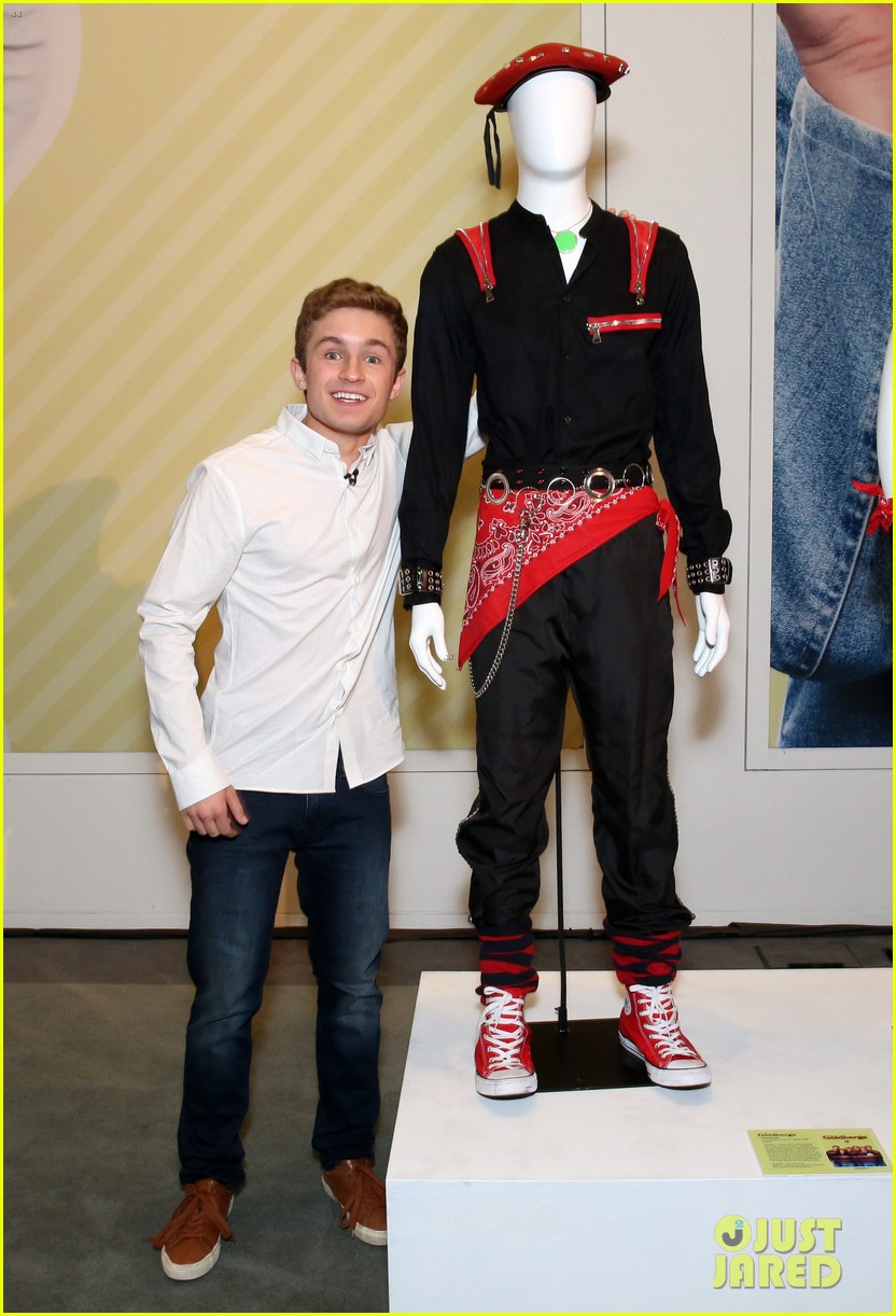 Hayley Orrantia Steps Out in Flirty Black Dress For 'The Goldbergs' Fashion Exhibit in LA