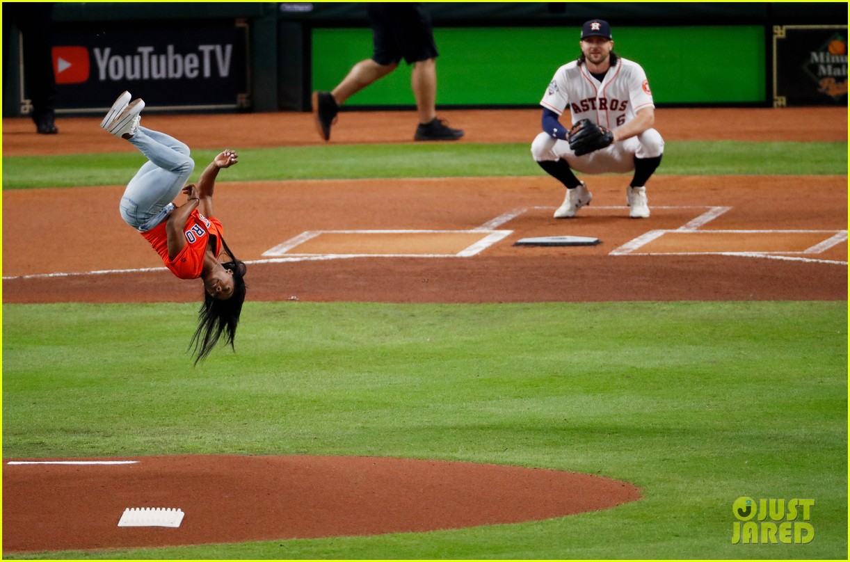 Simone Biles Does Backflip Before Throwing First Pitch At World Series - Watch Now!