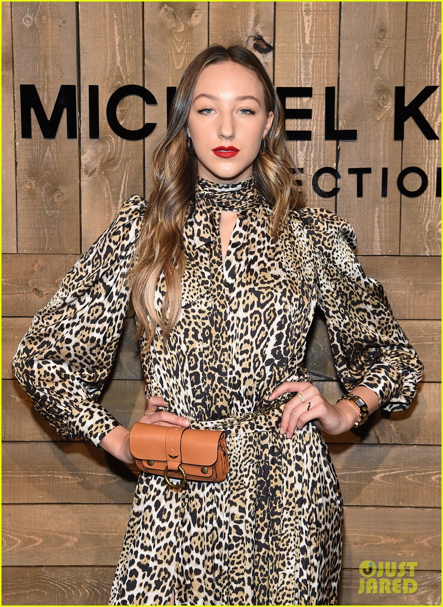 Dove Cameron Adds Tiny Twists To Her Hair For Michael Kors Fashion Show in NYC
