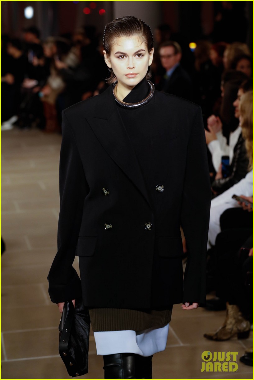 Gigi Hadid Wears Red Hot Coat For Proenza Schouler's Fashion Show