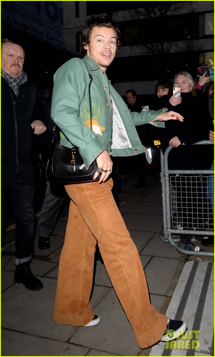 Harry Styles Sports Red Manicure & Gucci Purse for Radio Appearance