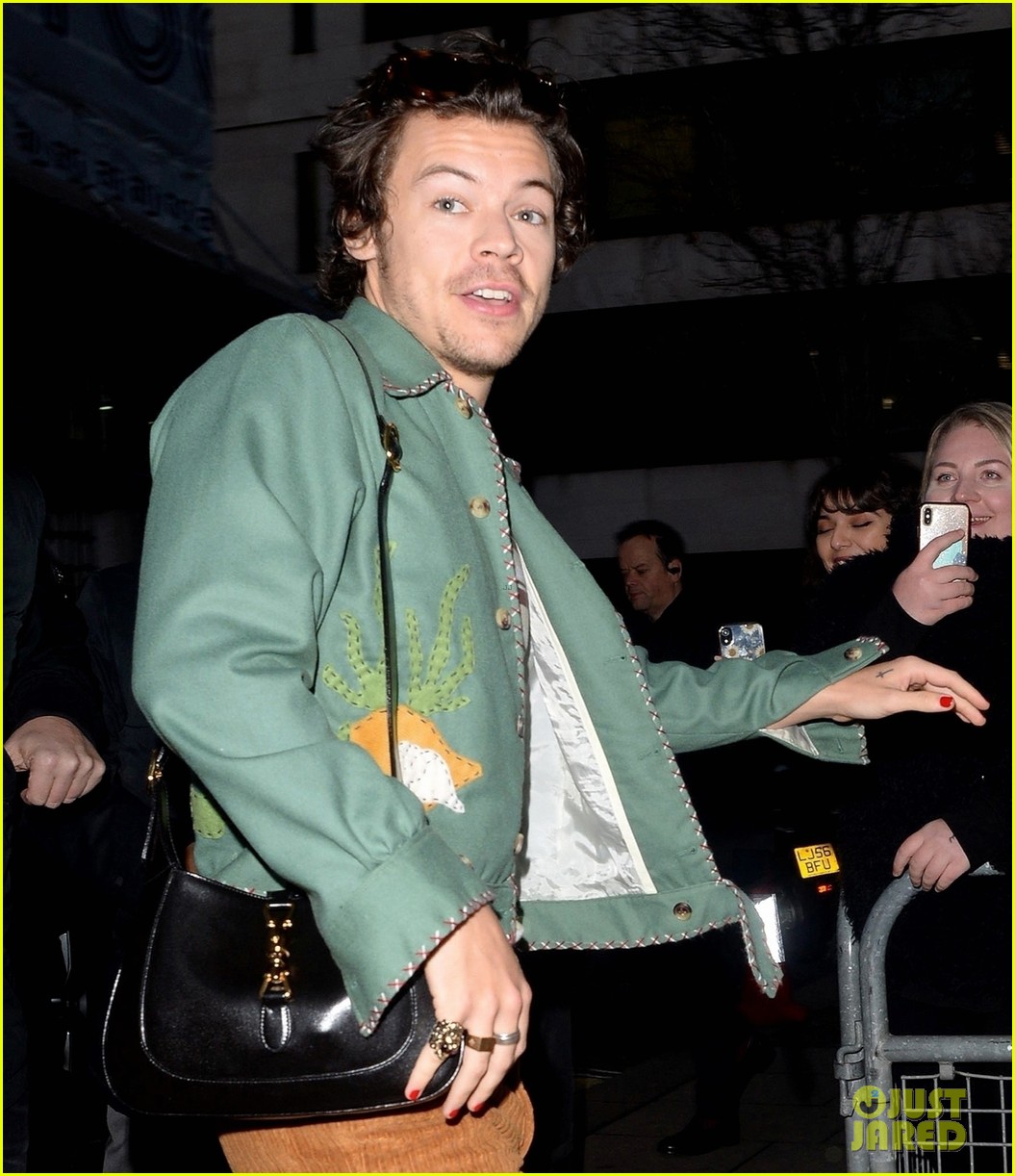 Harry Styles Sports Red Manicure & Gucci Purse for Radio Appearance