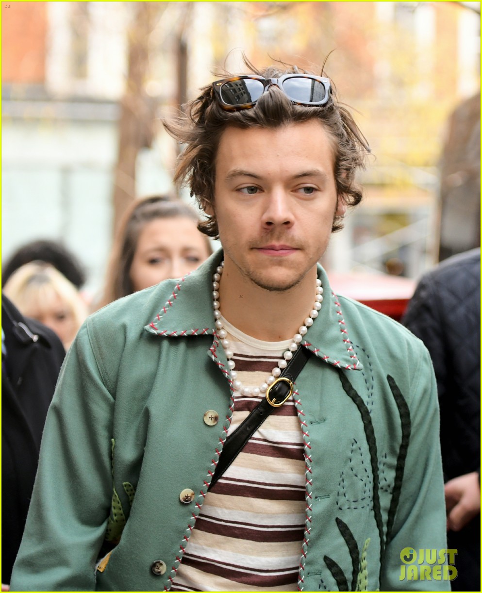 Harry Styles Sports Red Manicure & Gucci Purse for Radio Appearance