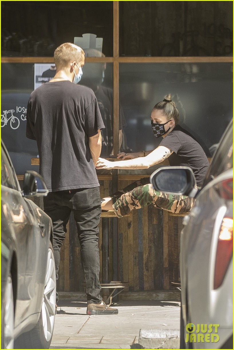 Miley Cyrus Wears a Gucci Face Mask for an Outing with Cody Simpson