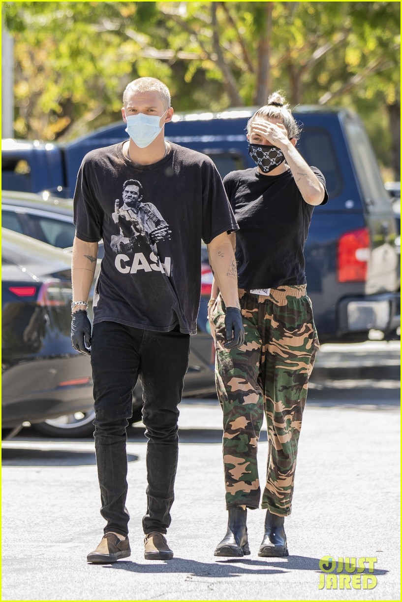 Miley Cyrus Wears a Gucci Face Mask for an Outing with Cody Simpson
