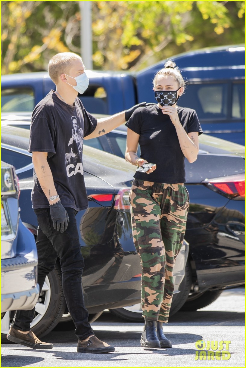 Miley Cyrus Wears a Gucci Face Mask for an Outing with Cody Simpson