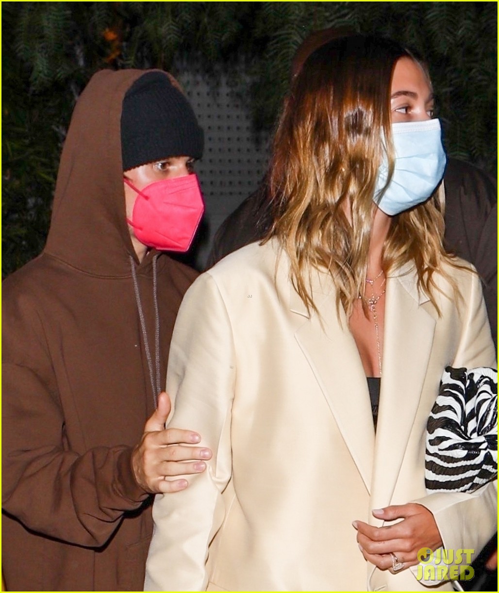 Justin Bieber Holds on Close to Wife Hailey While Leaving a Restaurant