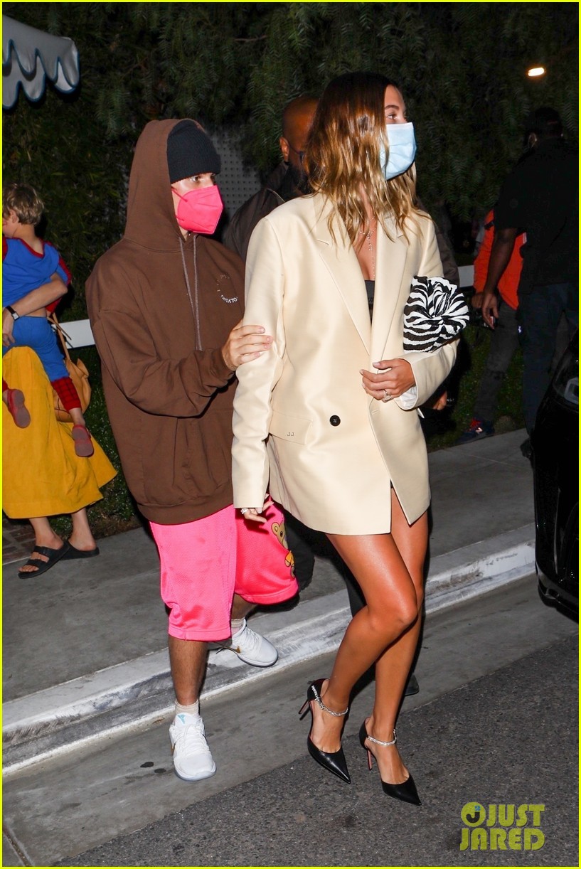 Justin Bieber Holds on Close to Wife Hailey While Leaving a Restaurant