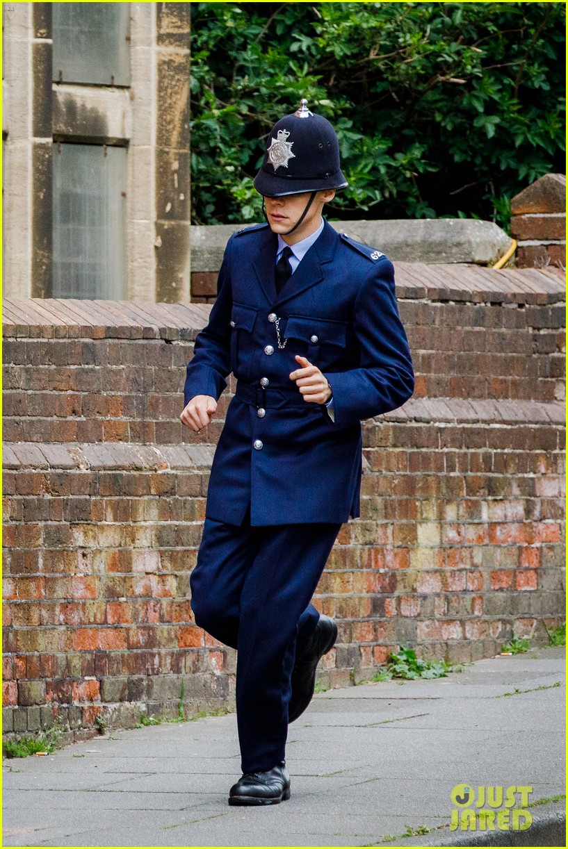Harry Styles Wears Full Policeman Uniform in New Set Photos with David Dawson!