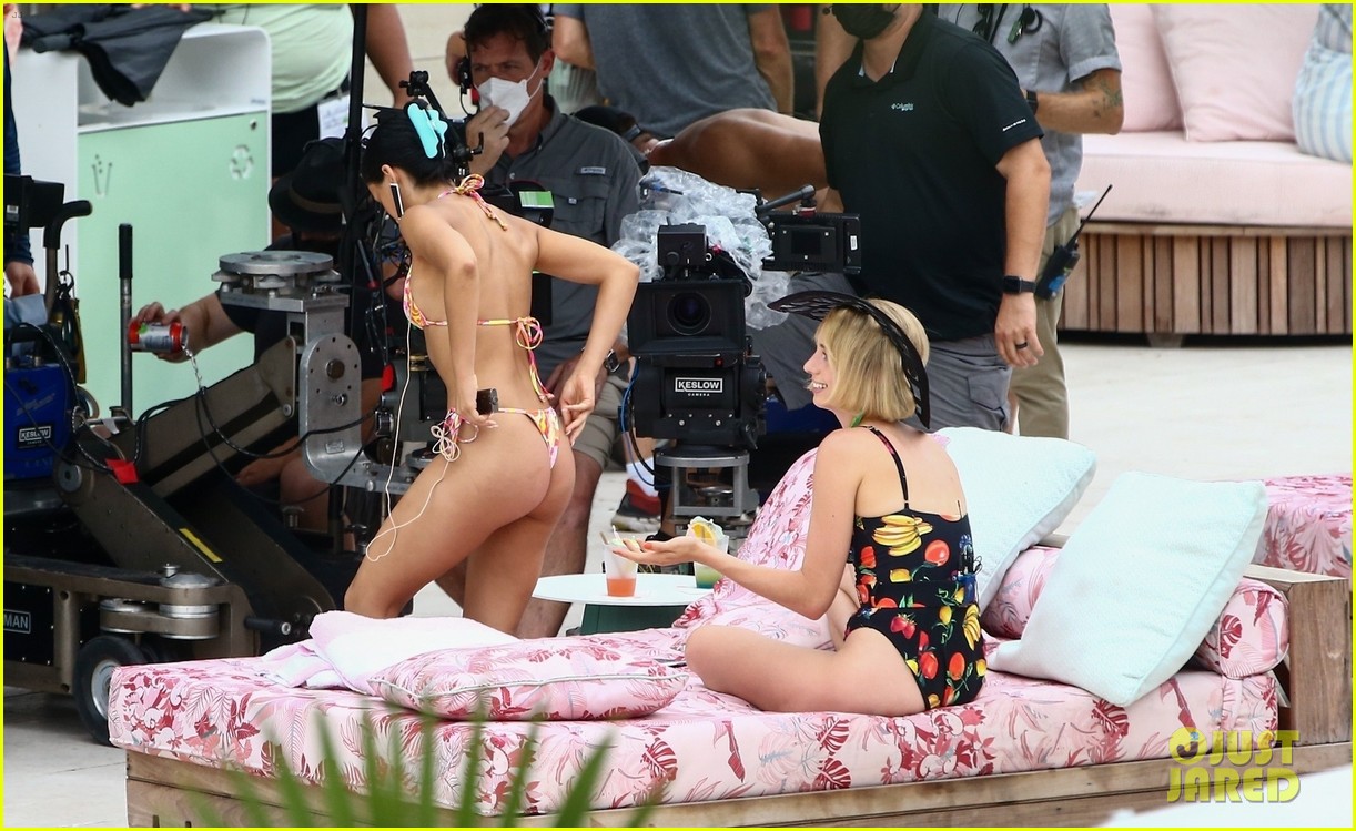 Camila Mendes & Maya Hawke Lounge By The Pool In Cute Suits While Filming 'Strangers'