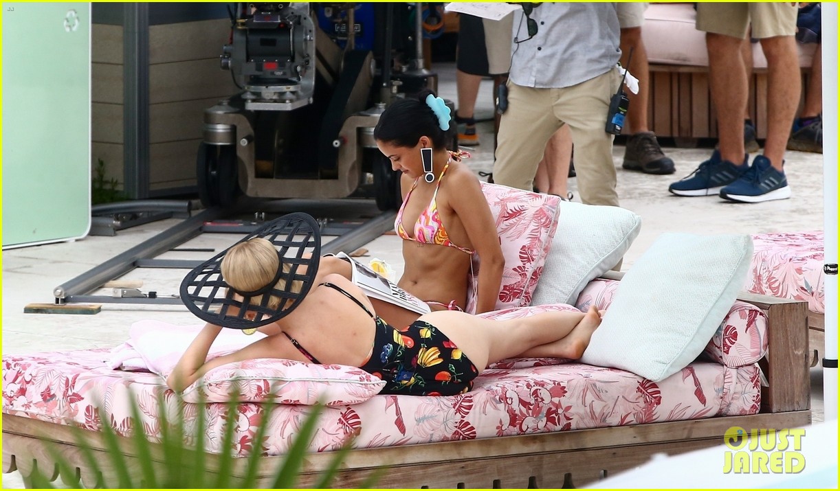 Camila Mendes & Maya Hawke Lounge By The Pool In Cute Suits While Filming 'Strangers'