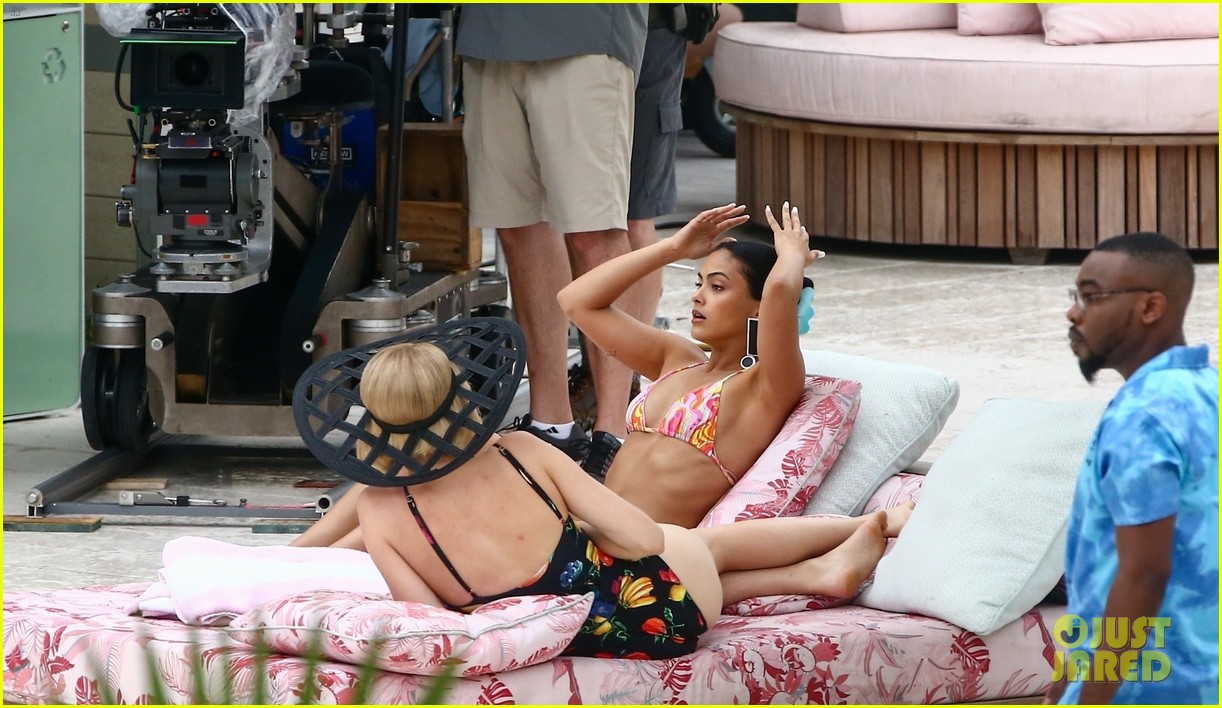 Camila Mendes & Maya Hawke Lounge By The Pool In Cute Suits While Filming 'Strangers'