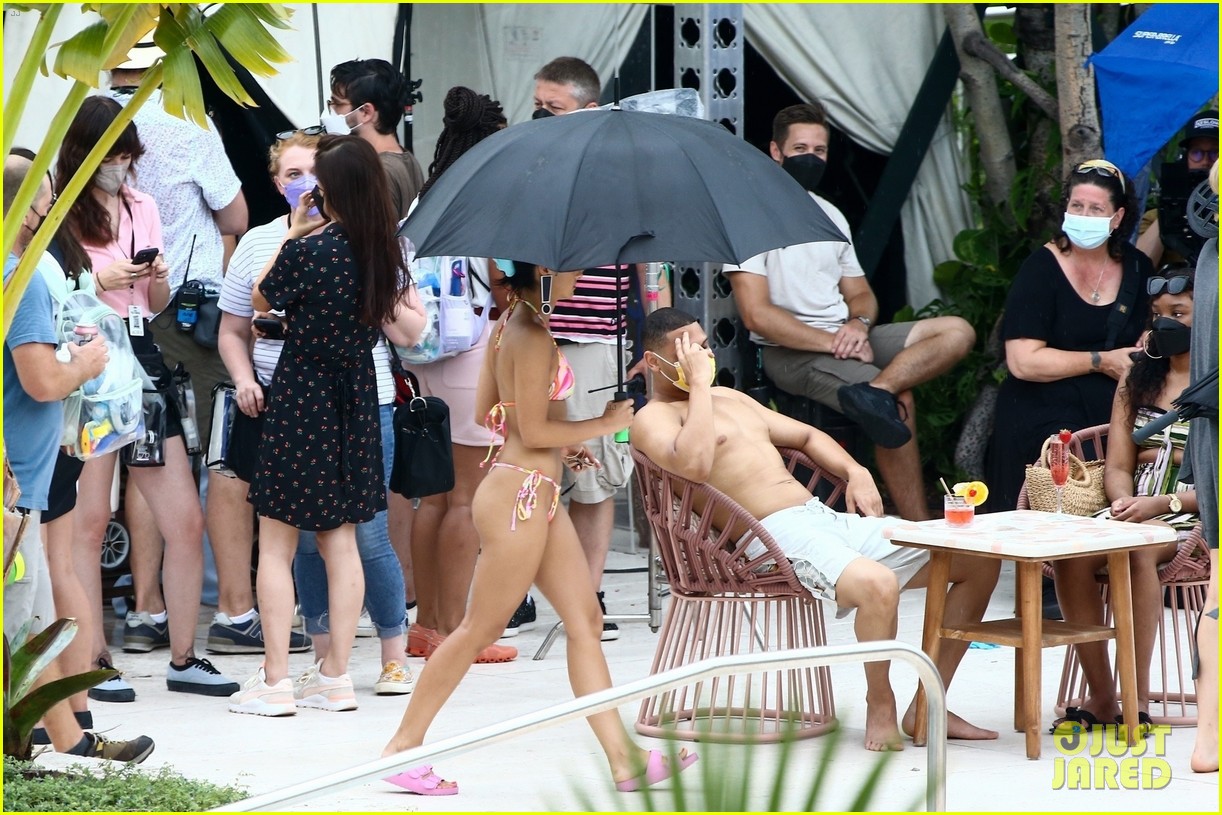 Camila Mendes & Maya Hawke Lounge By The Pool In Cute Suits While Filming 'Strangers'