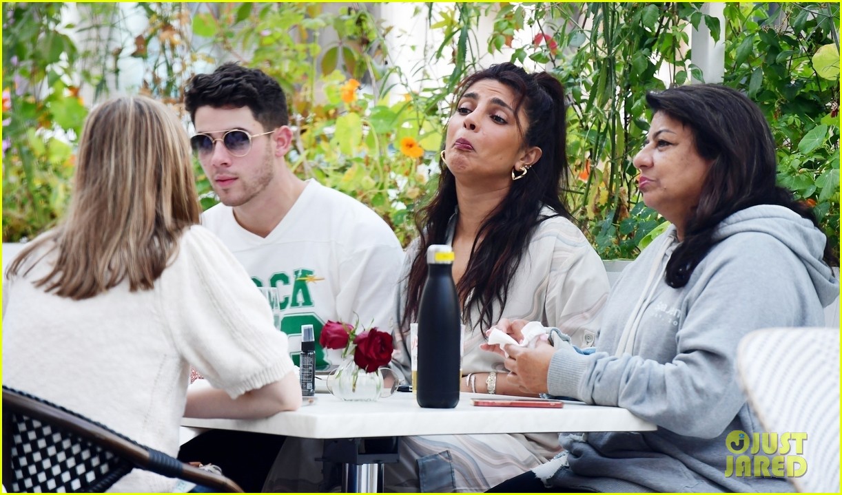 Nick Jonas & Priyanka Chopra Wrap Their Arms Around Each Other During London Outing!
