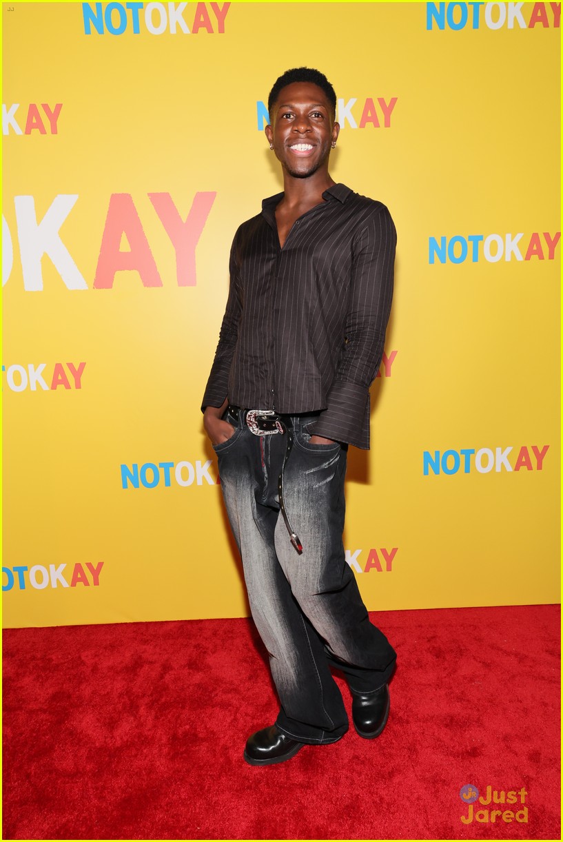 Dylan O'Brien Wears Hot Pink Suit to 'Not Okay' Premiere with Zoey Deutch