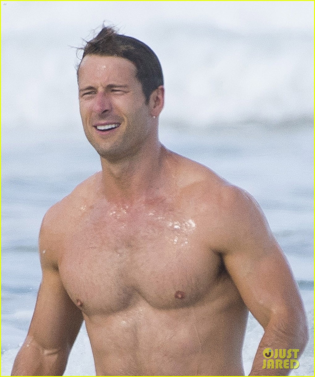 Sydney Sweeney Hits the Beach in White Bikini for Rom-Com Beach Scene with Glen Powell (Photos)