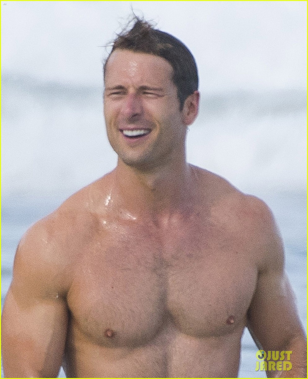Sydney Sweeney Hits the Beach in White Bikini for Rom-Com Beach Scene with Glen Powell (Photos)