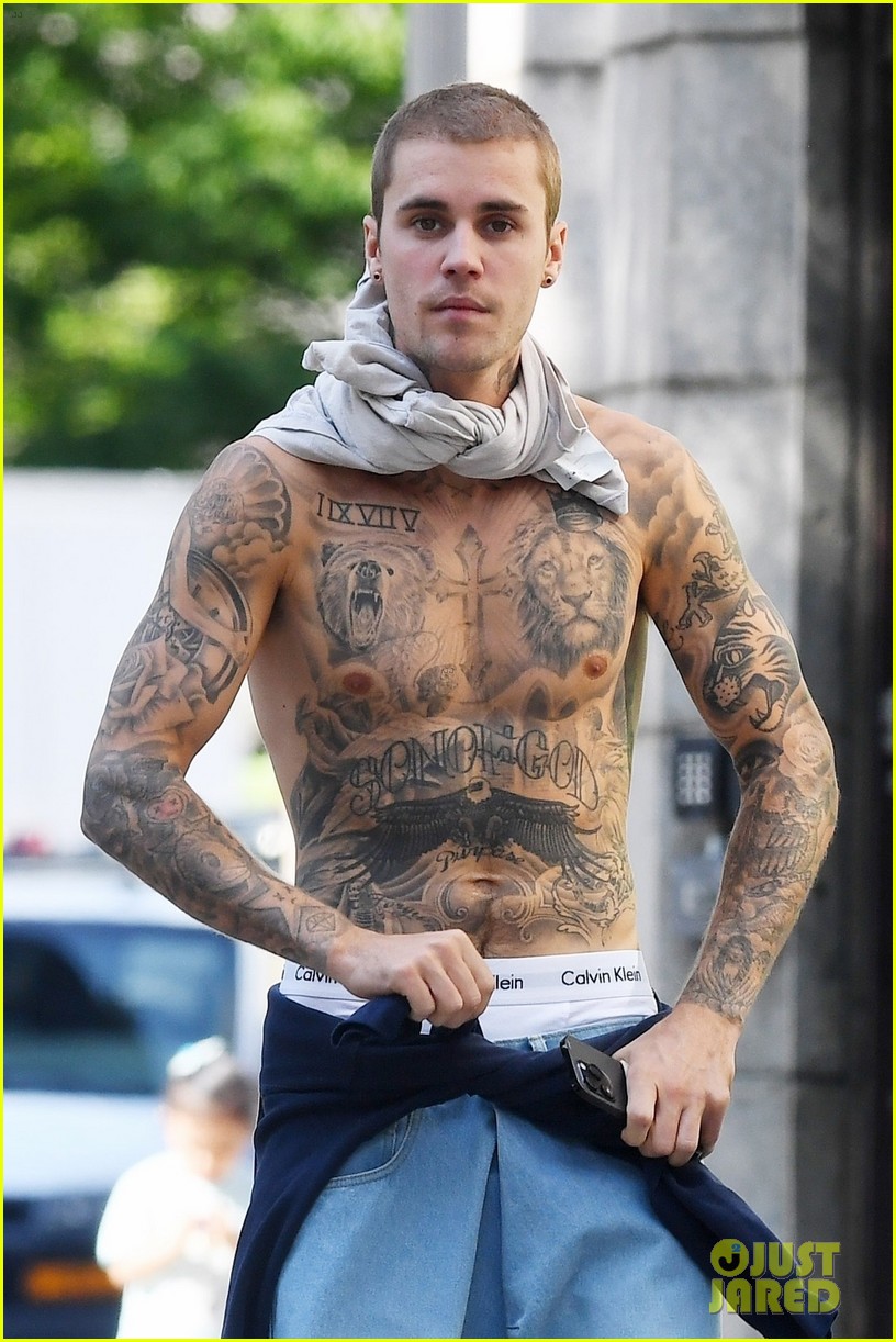 Justin Bieber Shows Off His Tattoos on Walk with Wife Hailey in NYC