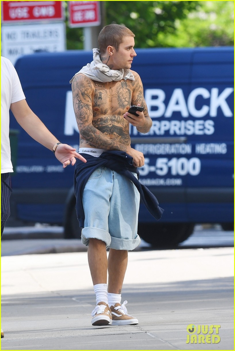 Justin Bieber Shows Off His Tattoos on Walk with Wife Hailey in NYC
