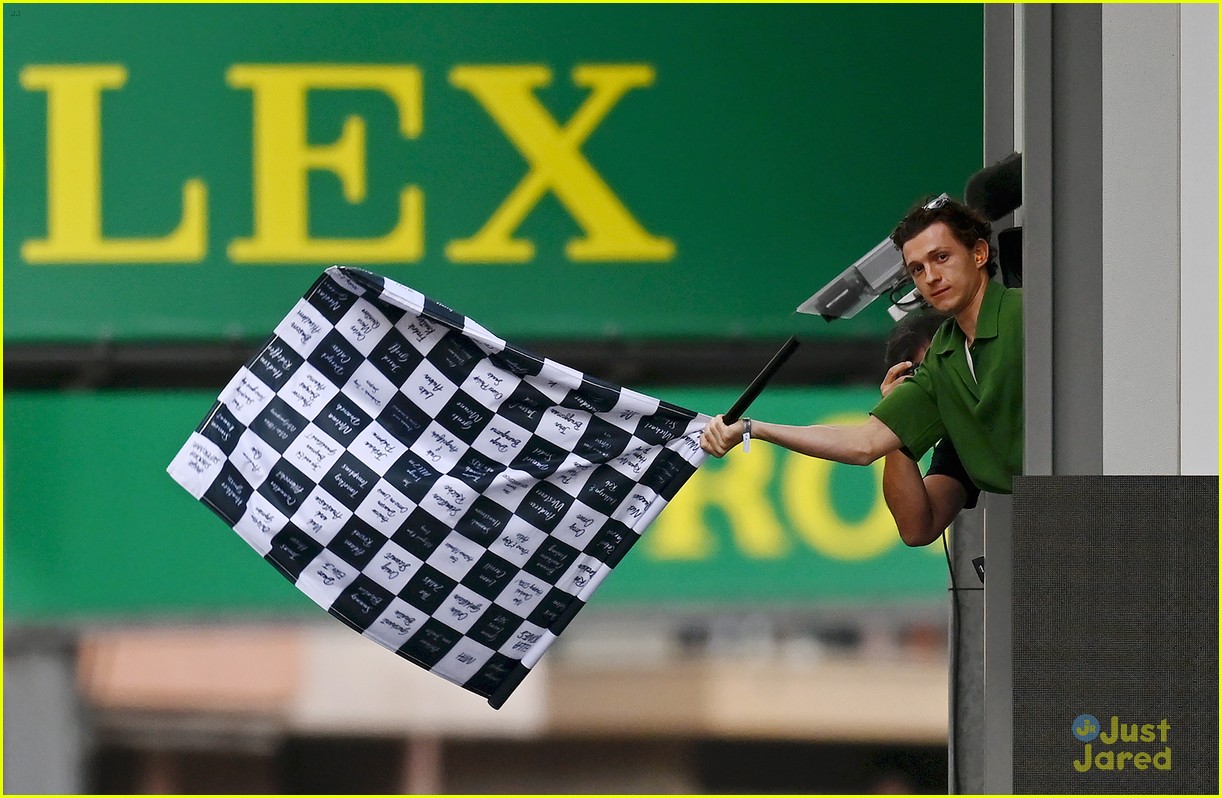 Tom Holland Waves Checkered Flag at F1 Grand Prix of Monaco